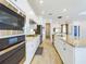 Clean and bright kitchen with stainless steel appliances at 17539 Polo Trl, Bradenton, FL 34211