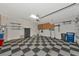 Garage with storage and checkered floor at 20861 Cattail Blvd, Venice, FL 34292