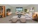 Relaxing living room with a lake view and comfortable seating at 20861 Cattail Blvd, Venice, FL 34292