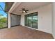 Covered patio with sliding doors and shade at 20861 Cattail Blvd, Venice, FL 34292