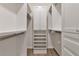 Bright walk-in closet with custom built-ins and drawers at 20861 Cattail Blvd, Venice, FL 34292