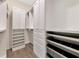 Well-organized walk-in closet with shelving and hanging space at 20861 Cattail Blvd, Venice, FL 34292