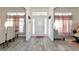 Bright and spacious entryway with tile flooring and neutral decor at 2155 Jagust Rd, North Port, FL 34288