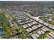 Aerial view of community featuring numerous homes and waterways at 2505 Riverbluff Pkwy # V196, Sarasota, FL 34231