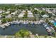 Aerial view of community marina and waterfront homes at 2505 Riverbluff Pkwy # V196, Sarasota, FL 34231