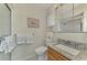 Bathroom with granite vanity, shower, and updated fixtures at 2505 Riverbluff Pkwy # V196, Sarasota, FL 34231
