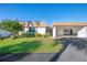 Front view of villa with carport and landscaping at 2505 Riverbluff Pkwy # V196, Sarasota, FL 34231