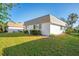 Charming exterior featuring a well-manicured lawn at 2505 Riverbluff Pkwy # V196, Sarasota, FL 34231