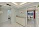 Bright kitchen features white cabinets, granite countertops, and modern appliances at 2505 Riverbluff Pkwy # V196, Sarasota, FL 34231