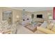 Spacious living room featuring ample natural light and comfortable seating at 2505 Riverbluff Pkwy # V196, Sarasota, FL 34231