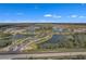 Aerial view of community with lakes and landscaping at 2508 Waterfront Cir, Sarasota, FL 34240