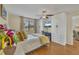 Main bedroom with white built-in wardrobes and wood floors at 2709 60Th Avenue N Plz # D, Bradenton, FL 34207