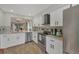 Modern kitchen featuring white cabinets and stainless steel appliances at 2709 60Th Avenue N Plz # D, Bradenton, FL 34207