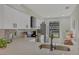 Modern kitchen with white cabinets, stainless steel appliances, and quartz countertops at 2709 60Th Avenue N Plz # D, Bradenton, FL 34207