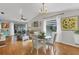 Open living room and dining area with hardwood floors at 2709 60Th Avenue N Plz # D, Bradenton, FL 34207