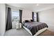 Large bedroom with king-size bed and ample natural light at 3408 Hilltop Cir, Bradenton, FL 34211