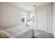 Spacious bedroom with carpeted floors and a dresser at 3408 Hilltop Cir, Bradenton, FL 34211