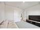 Versatile bonus room with sofa and TV at 3408 Hilltop Cir, Bradenton, FL 34211