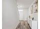 Bright entryway with wood-look floors and modern decor at 3408 Hilltop Cir, Bradenton, FL 34211