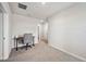 Bright home office features a workspace with desk and chair at 3408 Hilltop Cir, Bradenton, FL 34211