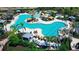 Large resort-style pool with plenty of lounge chairs at 3408 Hilltop Cir, Bradenton, FL 34211