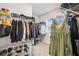 Large walk-in closet with ample shelving and hanging space at 3408 Hilltop Cir, Bradenton, FL 34211