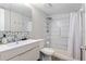 Modern bathroom with walk-in shower and updated fixtures at 3421 Clark Rd # 122, Sarasota, FL 34231