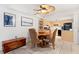Well-equipped kitchen featuring light wood cabinets and black appliances at 3421 Clark Rd # 122, Sarasota, FL 34231