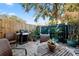 Spacious patio with brick flooring, grill, and ample seating at 3421 Clark Rd # 122, Sarasota, FL 34231