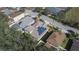 Aerial view showing home with solar panels and pool at 3439 101St E Ave, Parrish, FL 34219