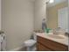 Clean bathroom with toilet, sink, and vanity at 3439 101St E Ave, Parrish, FL 34219