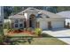 Curb appeal with 3-car garage and nicely landscaped yard at 3439 101St E Ave, Parrish, FL 34219