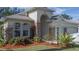 Landscaped front yard with stone accents and mature plants at 3439 101St E Ave, Parrish, FL 34219