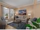 Spacious living room with comfortable seating and large artwork at 3439 101St E Ave, Parrish, FL 34219
