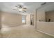 Spacious loft area with carpet and ceiling fan at 3439 101St E Ave, Parrish, FL 34219