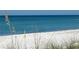 Beautiful view of sandy beach with blue water at 3710 Gulf Of Mexico Dr # D19, Longboat Key, FL 34228