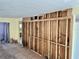 Living room with exposed wall and visible studs at 3710 Gulf Of Mexico Dr # D19, Longboat Key, FL 34228