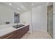 Modern bathroom with floating vanity and glass shower at 4136 Roberts Point Cir, Sarasota, FL 34242