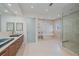 Spa-like bathroom with soaking tub and double sinks at 4136 Roberts Point Cir, Sarasota, FL 34242