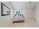 Spacious bedroom with a queen-size bed and large mirror at 4136 Roberts Point Cir, Sarasota, FL 34242