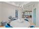 Elegant dining area with a view of the kitchen and modern light fixture at 4136 Roberts Point Cir, Sarasota, FL 34242