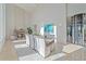 Bright dining room with modern table and fireplace at 4136 Roberts Point Cir, Sarasota, FL 34242