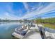 Private boat dock on calm waterway at 4136 Roberts Point Cir, Sarasota, FL 34242
