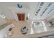 High-ceiling entryway with double doors and tile floors at 4136 Roberts Point Cir, Sarasota, FL 34242