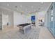 Relaxing game room featuring a pool table and fireplace at 4136 Roberts Point Cir, Sarasota, FL 34242