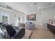 Luxurious home theater with plush seating and large screen at 4136 Roberts Point Cir, Sarasota, FL 34242