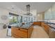 Gourmet kitchen boasting a large island, top-of-the-line appliances and water views at 4136 Roberts Point Cir, Sarasota, FL 34242