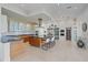 Modern kitchen with large island, stainless steel appliances, and ample cabinetry at 4136 Roberts Point Cir, Sarasota, FL 34242