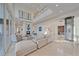 Spacious living area featuring a modern fireplace and ample natural light at 4136 Roberts Point Cir, Sarasota, FL 34242