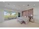 Spacious main bedroom with private balcony and water views at 4136 Roberts Point Cir, Sarasota, FL 34242